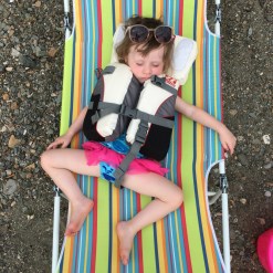 lucy sleeping on beachchair